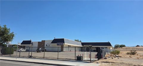 Photo of 15411 Village Drive #A, Victorville, CA 92394 (MLS # HD26035907)