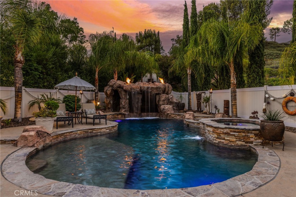 Welcome to your dream home in the coveted Wolf Creek community of Temecula!
This stunning 4-bedroom, 3.5-bath residence sits on a generous quarter-acre lot and is loaded with upgrades inside and out.
Step into the backyard and discover an entertainer’s paradise—featuring a custom rock waterfall, two shaded gazebos, a cozy fire pit, and a fully equipped outdoor BBQ kitchen perfect for unforgettable gatherings. Whether you're challenging friends at the horseshoe pit or unwinding in the tranquil setting, this outdoor space is built for both fun and relaxation.
Inside, you’ll find soaring vaulted ceilings, an open-concept layout drenched in natural light, and a spacious upstairs loft—ideal for a game room, home office, or additional lounge area. A three-car garage and oversized extended driveway ensure plenty of space for vehicles and guests.
All of this is nestled in the highly sought-after Wolf Creek neighborhood—just minutes from award-winning Temecula schools, shopping, dining, and the world-renowned Temecula Wine Country.