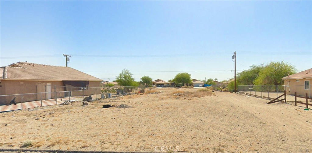 Ready-to-build residential lot in established Salton City neighborhood with water, electricity, and sewer available at street requiring connection. This cleared 0.22-acre flat parcel sits in heart of California's emerging Lithium Valley just 58 miles from Palm Springs where property values surged 17.5% in 2024. Located on Pampas Avenue with Penelope Avenue frontage creating unique T-configuration access and fire hydrant directly at property for enhanced safety and development appeal. Surrounded by quality custom homes in quiet residential area with paved road access and mature desert landscaping throughout neighborhood. Imperial County's $540 billion lithium deposit beneath this region is attracting major industrial investment while government commits $60+ million for Salton Sea restoration projects driving unprecedented growth. This flat buildable terrain offers immediate development potential with established infrastructure eliminating utility connection delays. Perfect for custom home construction, desert retreat, or investment in America's fastest-growing renewable energy corridor where lithium extraction begins commercial operations in 2025. Salton City provides 309 sunny days annually with outdoor recreation including Salton Sea State Recreation Area, Salvation Mountain art installation, and world-class geothermal hot springs all within 20 miles. Strategic location offers desert living with modern connectivity including satellite internet options up to 220 Mbps and same-day delivery from major retailers. Zoned residential with no HOA restrictions providing flexibility for your vision whether primary residence or vacation home in this appreciating market. APN 008-731-002-000 at coordinates 33.33119, -115.96565 for GPS navigation. Exceptional value at $19,900 for utilities-ready lot in region experiencing explosive growth as California's lithium capital emerges. Drive by today and secure your stake in Imperial County's transformation where desert opportunity meets established community living. Contact for immediate showing and development consultation in this rapidly appreciating Sonoran Desert location.