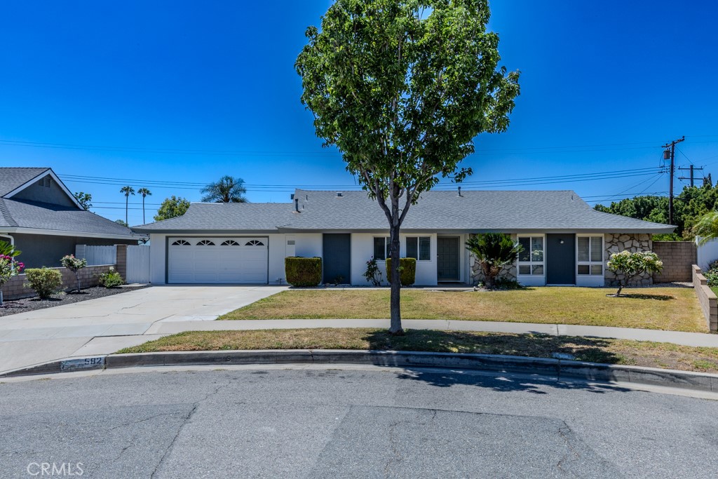 This four-bedroom 1 3/4 bath single story home is located on a beautiful Cul-de sac. It has new paint inside and outside, remodeled kitchen with island. gas log fireplace and hot tub. This home is air conditioned and comes with refrigerator, dishwasher stove, washer and dryer. It has double pane windows and a two-car garage. Outside it has a beautiful covered patio, orange, lemon and guava fruit trees, automatic sprinklers plus the gardening service is included.
