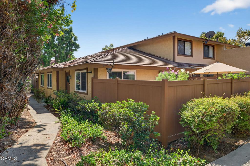 This fantastic updated 3-bedroom, 2-bath single-story end-unit condo in Parkside offers rare privacy with no neighbors above, and is tucked within a lushly landscaped, well-maintained community near the Ventura Government Center. Step inside to an inviting and open layout featuring newer durable plank flooring throughout, no carpet. The remodeled kitchen shines with beautiful granite countertops, white cabinetry, updated hardware, new faucet, stainless steel appliances, and an adjacent dining area perfect for everyday meals or casual entertaining.Enjoy a seamless indoor-outdoor lifestyle with two generous private patios--one off the living room with built-in brick planters ideal for gardening and entertaining, and another off the primary bedroom, offering a private retreat. Both patios are accessed through newer sliding glass doors, which, along with the new dual-pane windows throughout, flood the home with natural light and enhance energy efficiency.The two bathrooms have been tastefully remodeled, featuring contemporary finishes, upgraded vanities, fixtures, lighting and fans. Additional upgrades include updated baseboards, newer interior doors, new thermostat, and fresh paint throughout. Ceiling fans in bedrooms. The sale includes newer washer, dryer and refrigerator. You'll also enjoy a private 2-car garage with storage, convenient guest parking, and the benefits of a well-maintained community offering a pool, spa, lush landscaping, and HOA-covered insurance--including earthquake insurance. Plus, the home offers low utility bills thanks to its energy-efficient updates. The HOA replaced the roof in 2024 in this building. Located close to shopping, schools, parks, walking paths, and public transportation, this home offers comfort, convenience, and value in one of Ventura's most sought-after condo communities. Single-story 3-bedroom units in Parkside rarely come on the market--don't miss this opportunity!