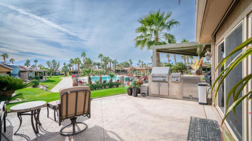 Nestled in the prestigious Vineyards Luxury Motorcoach Resort in Coachella, this Plan 3 Casita is an entertainer's dream. Overlooking the vibrant community and just steps from the resort's sparkling pool, it offers a perfect blend of luxury and convenience. The property features spacious RV parking with full hookups, ideal for large Class A motorcoaches, and stamped concrete that adds elegance and durability. The windows are fitted with durable security metal covers, ensuring your property stays safe. Motorized screen shades and an adjustable awning, operated effortlessly by remote, allow you to control light and shade with ease, creating the perfect ambiance. Thoughtfully designed and ideally located, this casita offers a lifestyle of comfort, security, and sophistication. Schedule a tour today and experience resort living at its finest!