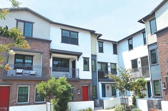 Built in 2022, this beautifully upgraded townhome is located in a highly desirable area. Situated within the gated community of Magnolia Square.
Offers modern living at its finest, with thoughtful upgrades and a prime location. Enjoy community amenities including a playground and BBQ area right in front of the home. This stunning tri-level home features 4 bedrooms and 3.5 baths with an open floor plan. Custom Shutters (4 1/4 inch), upgraded LED Recessed lighting and all SPC flooring throughout. Energy efficient central heating and air conditioning system, controlled by Ecobee smart technology. A main level bedroom with full bath provides perfect accommodation for visitors, a music room, office or an extended family room.
The second floor offers a bright, inviting living space with a kitchen, dining area, powder room, and living room that flows seamlessly onto the deck.
The upgraded kitchen features white quartz countertops, a custom-designed tile backsplash, stainless steel appliances, a stylish sink and faucet, a center island illuminated by modern pendant lights, white cabinetry with soft-close drawers, and a spacious walk-in pantry with laundry hookups.
The top floor features a master bedroom with a walk-in closet and organizer, dual sinks, and a large walk-in shower with a seamless glass door, along with two additional bedrooms and a full bathroom with dual sinks and a bathtub. Direct access to the side-by-side 2-car garage, complete with built-in storage cabinets, extra storage space, and durable epoxy flooring. Equipped with 220V outlets for high-capacity electric vehicle charging and a tankless Rheem water heater. Finished concrete work enhances the front porch area. Conveniently located near schools, shopping, dining, parks, the source mall, downtown Buena Park with easy access to the 5 and 91 freeways. Nearby Knott's Berry Farm and Disneyland. Magnolia square community offers amenities such as a children’s playground , a BBQ area and guest parking space. This property is a must see. Multiple upgrades in this house!
