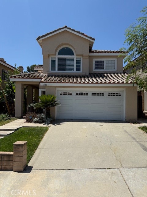Welcome to this spacious and inviting home nestled in a desirable neighborhood of Placentia. Ideally located close to shopping and comfort and accessibility. Step inside to find soaring Cathedral ceilings and dual fireplaces in both living room and family rooms, creating a warm atmosphere.
The kitchen has an open floorplan next to the family room perfect for family gatherings. The primary en-suite boasts a separate shower and tub with walk-in closet, with four more bedrooms and two full bath rooms, there's plenty of space for a growing family or guests. Outside space has plenty of fruit trees to enjoy all season. This home is in a welcoming community with amenities like a near by pool maintained by the HOA. Though it may need TLC its full of potential and located in a well kept neighborhood.