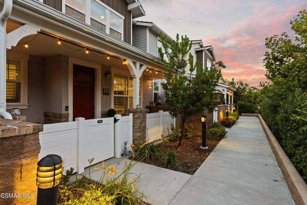 Welcome to this stunning townhome with a rare spacious (two car) driveway featuring 3 bedrooms, 2.5 bathrooms, and 1,393 Sq ft of thoughtfully designed living space. Built in 2021 and ideally located in the heart of Simi Valley, this home blends modern style with everyday comfort.The inviting entry opens to a light-filled living area with 9-foot ceilings, recessed lighting, and an open-concept layout. The chef's kitchen is the centerpiece featuring quartz countertops, upgraded stainless steel appliances, a spacious pantry, a large peninsula with breakfast bar, and a beautiful custom built-in for added storage and style. The adjacent dining and family rooms are bright and welcoming, perfect for entertaining.Upstairs, the private primary suite includes a walk-in closet, dual vanities, and an oversized shower. Two additional bedrooms, a full bath, and a dedicated laundry area complete the upper level.Enjoy the rare bonus of a full driveway plus direct access to a 2 car garage a unique feature in this community. Additional features include dual pane windows, ceiling fans, central AC/heat, whole house water filtration with conditioner, and an enclosed front patio.Community amenities include a pool, spa, fire pit, bocce ball court, picnic area, rose garden, dog park, and kids' play area.
