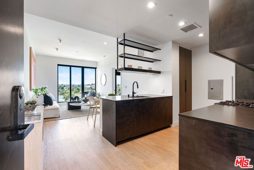 Photo of 10700 Tabor Street #318, Los Angeles, CA 90034 (MLS # 25609769)