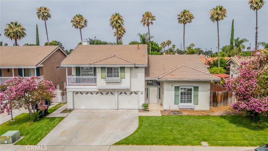 Welcome to the Village of Heritage Community! This stunning two story pool home offers 2,182 sq ft of living space on a generous 7,200 sq ft lot, featuring 4 bedrooms, 3 bathrooms, and a 3-car garage and it’s move-in ready! Upgrades include new interior paint and new flooring throughout. Step inside to soaring vaulted ceilings and an elegant open staircase. The first floor features a bright and spacious formal living and dining area, a bedroom and full bathroom, and a remodeled kitchen with quartz countertops, new cabinetry, stainless steel sink, new stove, and microwave. The adjacent family room boasts a cozy fireplace and opens to a huge backyard with a newly plastered pool and spa perfect for entertaining. Upstairs the master bedroom includes a remodeled bath with dual sinks, separate tub and shower, and a walk-in closet with mirrored sliding doors. Two additional bedrooms share a private outdoor balcony. And a full hall bathroom. Located in the highly acclaimed Etiwanda School District, and just minutes from Victoria Gardens, Ontario Mills, and easy access to the 15 and 210 freeways. Don’t miss your chance to own this beautiful home!