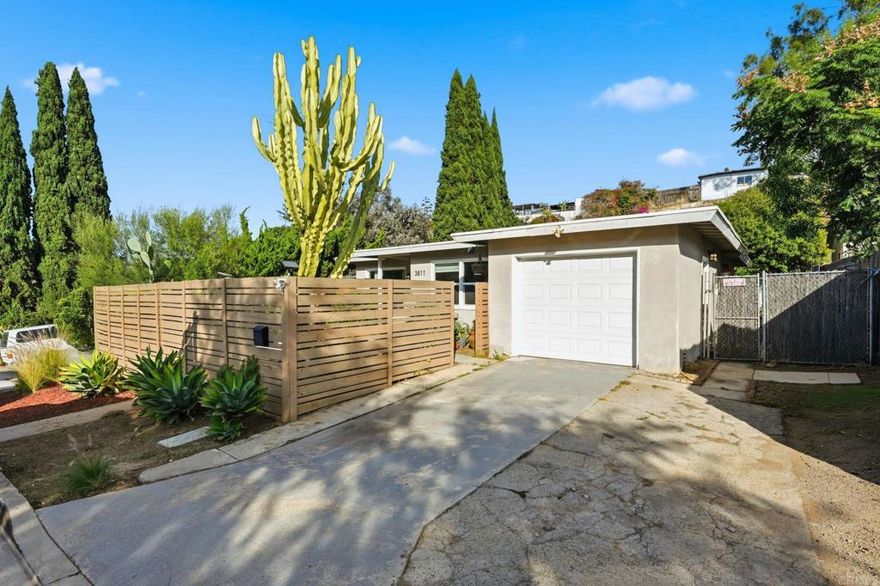 Beautifully updated single-story home in Rolando Park with incredible flexibility for both homeowners and investors! This 3-bed / 2-bath property sits on an oversized lot, offering room to grow whether you’re dreaming of extra space for family, outdoor living, or future income-producing potential like an ADU. Inside, you’ll find a bright, move-in-ready interior with modern upgrades throughout, fresh finishes, updated bathrooms, and a comfortable floor plan that flows easily from the living area to the bedrooms. It’s a perfect fit for anyone who wants a stylish home without the need for major renovations. For investors, this location checks every box: proximity to SDSU, high rental demand, and a large lot ideal for expansion, multi-unit layouts, or long-term equity growth. For homeowners, it offers the best of both worlds, live in a beautiful home now while holding onto future upside. Whether you're looking for a personal residence with space to create your dream backyard, or a smart investment with built-in rental demand, this is a rare chance to own a versatile property in a highly desirable neighborhood.