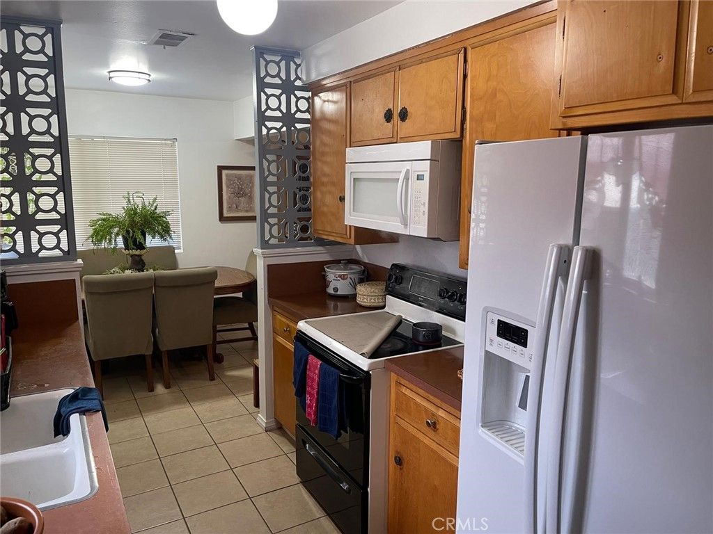 Photo of 41540 Marine Dr, Hemet, CA 92544 (MLS # PW25260913)