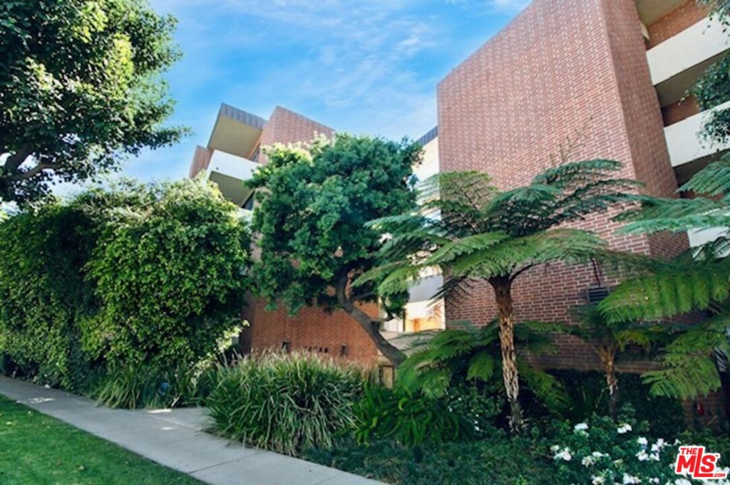 Beautifully remodeled 3rd- floor unit in the heart of Brentwood Village, one of the premier neighborhoods in all of Los Angeles. Set away from the street with a courtyard view, this stunning unit features an open kitchen with granite counters and stainless steel appliances. The bathroom was recently upgraded with high-end Italian tiles and fixtures. Spacious living room with large private balcony, wood floors, central heat and A/C. This unit features exposed brick accent walls and comes with 2-Car Parking in the gated community garage. The building has wonderful amenities such as a pool, new exercise room, controlled access lobby and garage, guest parking, rooftop garden, rec room, elevator and new mailroom for packages. Incredible location just blocks to the best that Brentwood has to offer including Belwood Bakery, Starbucks, Clarks, Peppone's, salons, shops and Barrington Park. Near UCLA, the 405, and transportation. This is a great opportunity- won't last!