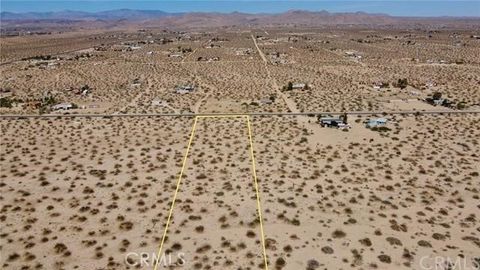 Photo of 1155 Belfield Boulevard, Landers, CA 92285 (MLS # JT26028342)