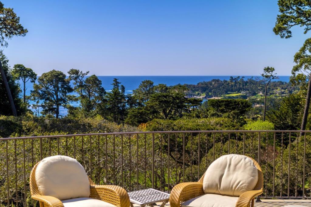 Just moments from The Lodge at Pebble Beach, this exquisite Mediterranean-style estate captures breathtaking panoramic views stretching from Pescadero Point to Point Lobos. Reimagined by renowned contractors Stocker & Allaire, the home has been masterfully renovated to enhance natural light, expand the ocean-view terrace and introduce refined architectural details throughout. Designed for effortless entertaining, the heart of the home features a chefs kitchen with a generous island, seamlessly flowing into the open-concept family room, living room, and dining area complete with a stylish wet bar. The luxurious primary bedroom suite offers a peaceful retreat with a fireplace, custom built-ins, spa-inspired bath, walk-in closet, and convenient access via stairs or elevator. Just down the hall, two beautifully appointed guest suites provide comfort and privacy, while two additional suites on the lower level offer ample accommodations for visitors. Additional highlights include private patios ideal for outdoor relaxation, state-of-the-art golf simulator room with wet bar and temperature-controlled wine cellar with 1,100+ bottle capacity. Located in the sought-after sunbelt of Pebble Beach, this exceptional home blends luxury, comfort and the ultimate golfers lifestyle.