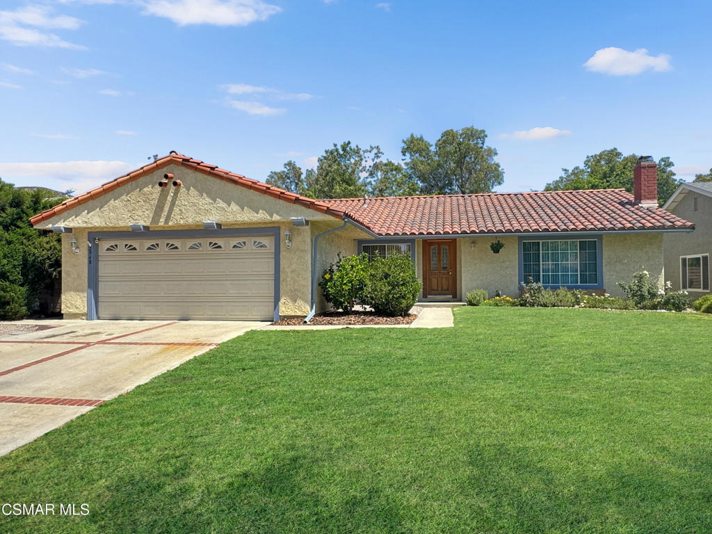 Located adjacent to one of the most popular golf courses in Southern California, this 4 bedroom single story offers direct access to the club house. Whether you love to golf or not, you will love the location in the desirable Texas Tract. Renown for its warm inviting neighborhood, residents LOVE living here for its proximity to shopping, amazing schools, and convenient access to the Valley, Los Angeles or the Southern California beaches. The home was built for our temperate California climate and designed for indoor/outdoor living. Massive sliding glass doors lead to a covered patio which is perfect for BBQ's and sunset dining. Expansive tall ceilings in the living room and family room create open light combined spaces. Cozy up on the couch in front of the fireplace or throw a dinner party in the formal dining room. The family room and kitchen combine to create a very livable place to relax. The master bedroom also features vaulted ceilings, a beautiful view out to the lush backyard and it has a walk-in closet. The home has it's a separate laundry room with a convenient sink. There's direct access to the two car garage with loads of opportunity for storage. This model also features a large attic which other owners have finished off. Unwind after a long day in your private backyard, or walk out the back gate and onto the Simi Hills Golf Course for a round of amazing golf!
