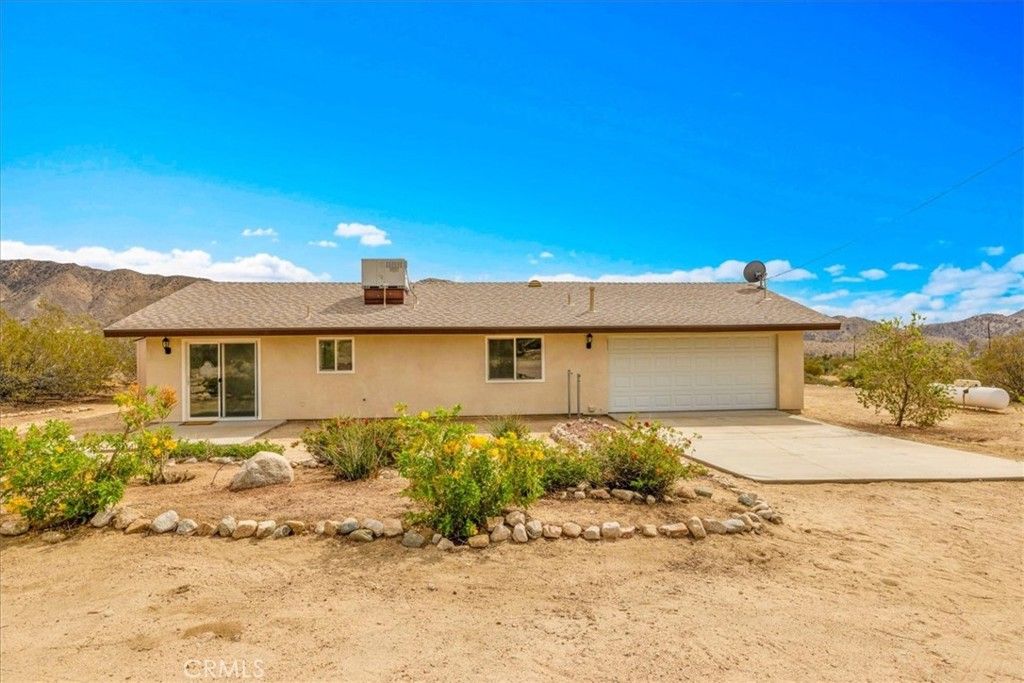 Photo of 8887 Little Morongo rd Rd, Morongo Valley, CA 92256 (MLS # JT25240419)