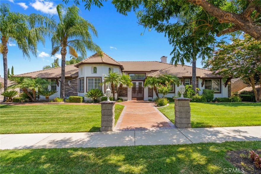 Welcome to The Orchards by Amberhill—a stunning single-story estate offering nearly 4,000 sq ft of luxury living on almost half an acre. This 5-bedroom, 4-bath home features soaring ceilings, an open floor plan, and elegant finishes including crown molding, plantation shutters, custom woodwork, and travertine flooring. The chef’s kitchen boasts a large island with farmhouse sink, granite counters, and a spacious breakfast nook that opens to the family room. The primary suite is a true retreat with vaulted ceilings, fireplace, spa-inspired bath, and custom cabinetry. Designed for entertaining, the backyard showcases a rock saltwater pool with waterfalls, a covered patio with fans and built-in stereo, gazebo, and shuffleboard court. Gated RV parking and a 3-car garage with epoxy floors complete this one-of-a-kind property.



Located in highly desirable South Corona, this home offers access to award-winning schools including Santiago High and Orange Elementary. Enjoy nearby shopping, dining, Dos Lagos and The Crossings, golf courses, parks, and easy freeway access to the 15 and 91—perfect for commuters. This is luxury living at its finest in one of Corona’s most sought-after neighborhoods.