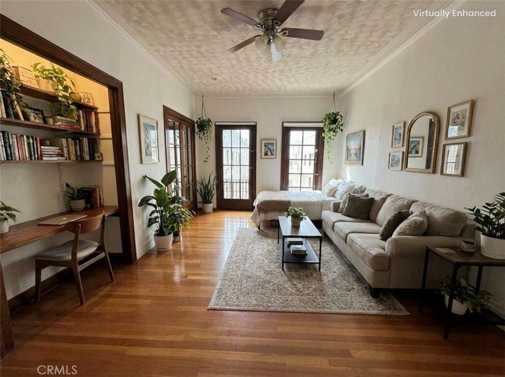 Photo of 2121 James M Wood Blvd #412, Los Angeles, CA 90006 (MLS # GD26039166)