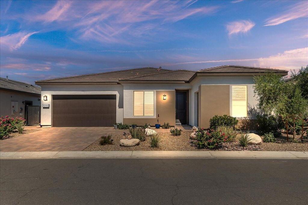 Discover effortless indoor/outdoor living in this stunning Shea Designer series Proclaim home!Designed for entertaining and everyday comfort, this residence features dramatic sliding glass walls that connect the great room and dining area to a spacious covered patio--blurring the line between inside and out. Imagine hosting friends under the desert sky or enjoying a quiet morning coffee in the open air. Located in the vibrant Trilogy at The Polo Club, this home offers access to resort-style amenities, social opportunities, and a lifestyle unlike any other in this 55+ community. Solar is fully paid and included. Options are shown on the attached document for your review.At the heart of the home, the gourmet kitchen shines with quartz countertops, upgraded appliances, and white Shaker-style cabinetry--a perfect blend of elegance and function. The light-filled living spaces invite gatherings both large and small.Your private retreat awaits in the serene primary suite, generous walk-in closet, and peaceful views of the landscaped backyard.Seller's Polo Club Membership transfer is available for $1,875 plus monthly fee of $215,the social ''Clubhouse'' Membership grants exclusive access to a refined collection of amenities, including premier tennis and pickleball courts, a state-of-the-art fitness center, resort-style and lap pools, an elegant poker and billiards lounge, a sophisticated restaurant and bar, inspiring artisan and culinary studios, and the crown jewel of it all--the beautifully designed clubhouse, the centerpiece of community life.