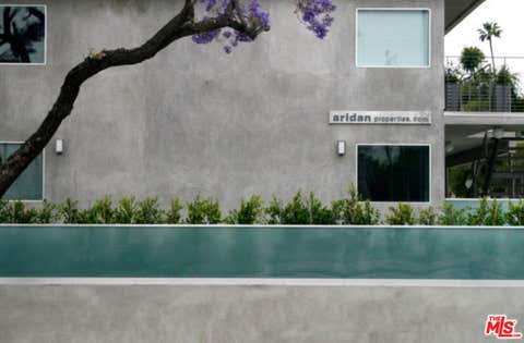 Photo of 9100 Whitworth Drive #8, Los Angeles, CA 90035 (MLS # 26869515)