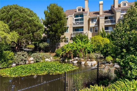 Photo of 20251 Cape Coral Lane #315, Huntington Beach, CA 92646 (MLS # OC25225484)