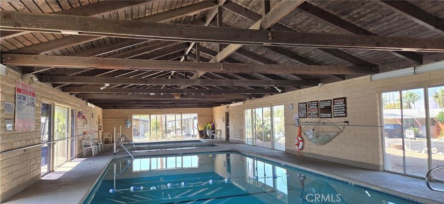 Beautiful 2 Bed + Bonus Room Home with the community's very own Natural Mineral Hot Springs Pool & Spa!



Welcome to this beautifully updated 2 bedroom, 2 bathroom home with a bonus room in the gated 55+ community of Joshua Springs, just minutes from Palm Springs! Enjoy the benefits of a natural healing mineral water pool and spa, low HOA fees, and resort-style living.



This light and bright home features vaulted ceilings, an open floor plan, custom kitchen with soft-close cabinets, stainless steel appliances, recessed lighting, and newer flooring. Bathrooms have been newly renovated, and the home includes a newer A/C unit, updated plumbing, double-pane windows, and fresh exterior paint with roof upgrades.



Relax in your private backyard oasis with fruit trees, low-maintenance landscaping, and drip irrigation. A large front porch is perfect for desert evenings, and the storage shed offers potential as a workshop.



LOW HOA includes land tax, water, trash, sewer, internet, and cable. This unique self-governing community offers shared ownership and access to one of the area's best-kept secrets—healing hot mineral springs!