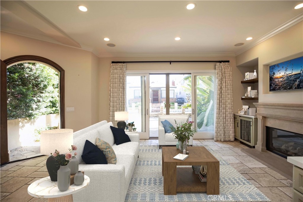 Lovely North Hermosa Walkstreet Home. This bright, open floorplan makes the most of walkstreet living. The kitchen, dining, and living room are all on the main level and open out to the walkstreet with magnificent floor to ceiling doors. Enjoy entertaining indoors or dining al fresco! This comfortable home features 4 bedrooms plus an office and a large media room. The media room is located on the lower level and is perfect for entertaining or just hanging out. There's also an amazing roof top deck. Situated just 2 blocks to the beach on a charming walkstreet. You can also take advantage of the green belt just 2 blocks away and Hermosa Valley Park which just 3 blocks away. This is an ideal location!