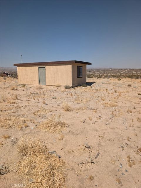 Photo of 56850 Bodick Rd, Landers, CA 92285 (MLS # JT26029075)