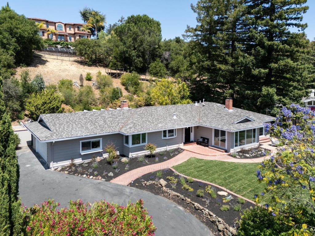 Located on the west side, this homes elevated position at the end of a cul-de-sac offers beautiful western hill views. On the market for the first time in 40 years, this classic ranch home has 3 bedrooms and 2 baths on one level and is ready to move in and enjoy or an opportunity to transform or even build new on this expansive lot. Spanning two-thirds acre, the extra-large property features terraced and level grounds with newly refreshed landscaping. Recent updates inside include new paint inside and out, new carpet in the living room, and updated lighting, plus there are hardwood floors in most rooms. Coveted access to excellent Los Altos schools and a location minutes to the Village and to Highway 280 elevates this exceptional offering.