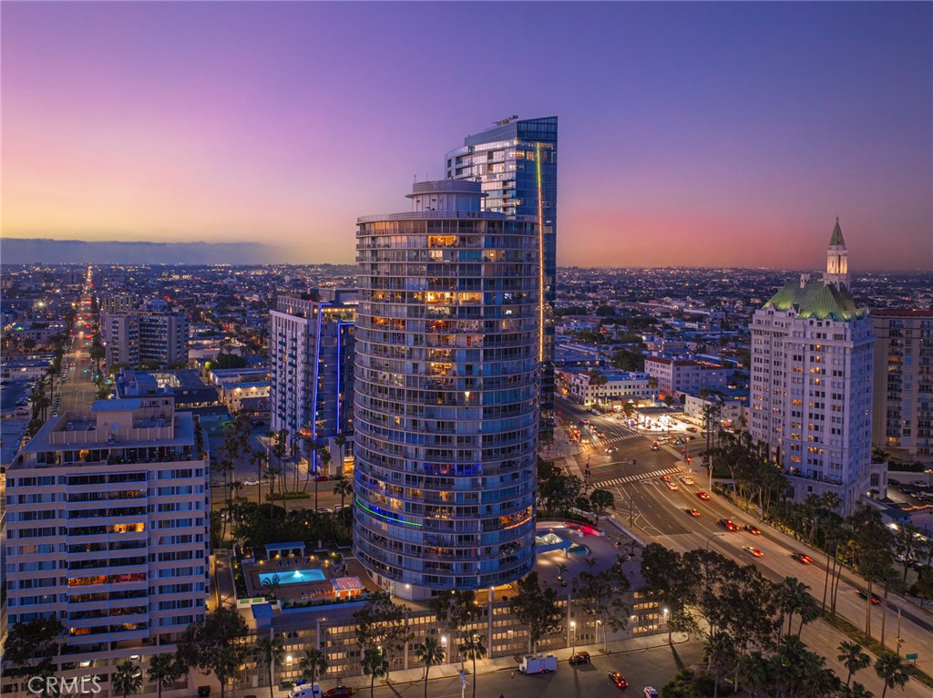 Welcome to Unit 1208 at the iconic International Tower, a rare three-bedroom, two-bathroom condo offering one of the most desirable floor plans on Ocean Boulevard. Perched on the 12th floor, this home features a full wraparound balcony with uninterrupted views of the Pacific Ocean, Catalina Island, the Queen Mary, and the Long Beach Grand Prix track, giving you front-row seats to the best of downtown Long Beach, including the upcoming Olympic events.
Beautifully remodeled in 2020, the interior showcases porcelain tile flooring throughout, custom marble-tiled bathrooms with Kohler fixtures and bidet-equipped toilets, upgraded stainless steel appliances, full-size stackable laundry, smart-home lighting with energy-efficient LED fixtures, and an enhanced water heater designed for modern living.
The International Tower offers residents 24-hour security, a renovated lobby, a fitness center, a resort-style pool deck, and conference rooms, all within steps of the sand, the Pike, and the city’s best dining and entertainment. With a prime location, remodeled finishes, and panoramic views, this property represents one of the best values on Ocean Boulevard under $1M.