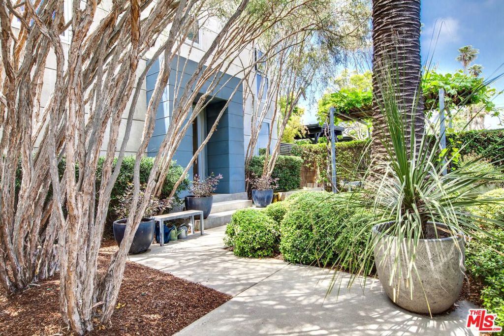 Experience the warmth and allure of luxury living in an expansive, beautifully furnished Venice Beach lease. Nestled in the highly sought-after Milwood neighborhood, this modern home with 5-bedrooms, 3.5 bathrooms plus separate guest house with 1-bedroom, 1-bathroom, showcases exquisite artistic furnishings and decor that exude elegance and sophistication. The 2-story main house boasts a spacious layout, featuring a living room with a fireplace and a bar area that doubles as a second kitchen. It also includes a cozy family room, a dining room, and a gourmet kitchen fully outfitted with top-of-the-line appliances, utensils, and cookware. The property is further enhanced by a well-equipped gym and laundry facilities on both levels of the main house. The 5 bedrooms are complete with quality linens, and there are 3.5 bathrooms in the main house including the luxurious primary bathroom. The outdoor spaces are a serene oasis, boasting gardens adorned with olive trees, lilacs, and succulents. Savor alfresco dining by the tranquil water feature, or relax on the rooftop deck, complete with seating and lounge chairs, perfect for enjoying the California sun. At the back of the property is an inviting, 1-bedroom 1-bathroom detached guest house complete with high beam ceiling, kitchen, living room, and patio. Situated west of Lincoln, this exceptional residence is ideally located, offering convenient access to the vibrant shops and renowned restaurants on Abbot Kinney, as well as close proximity to the beach. Embrace the unparalleled allure of Venice living in this exquisite and very private home.