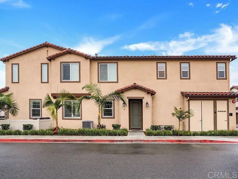 Just listed... a beautifully upgraded two-story, two-bedroom home located in Parc Place within the Montecito community of Otay Ranch.  This corner unit features an attached one-car garage plus an additional assigned parking space.  Each bedroom includes its own private bath and new carpeting.  Highlights include a spacious living room, modern kitchen with granite countertops and stainless- steel appliances, balcony, and window coverings. Conveniently situated within walking distance to the elementary school and just minutes from shopping, dining and public transportation.    Waiting for the new owner/s and a quick escrow!