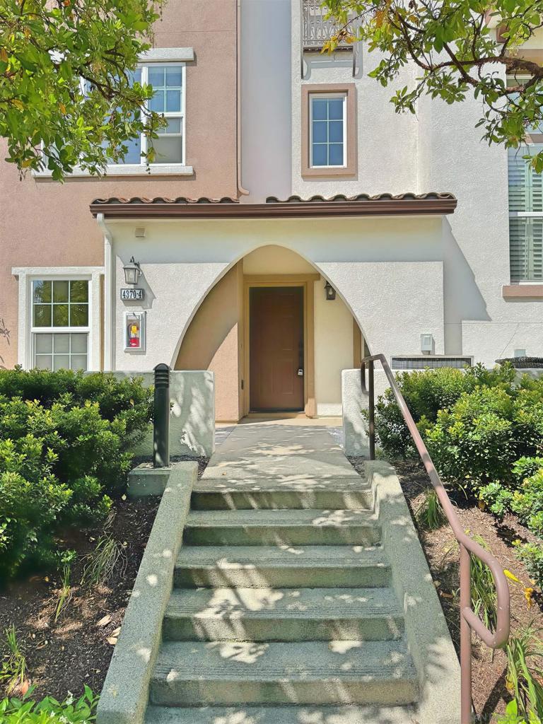 Experience modern living in this beautifully upgraded and newly renovated (2024) 2-bedroom, 2.5-bath townhouse, offering 1,645 square feet of thoughtfully designed space. Step inside to find hardwood flooring throughout, soaring high ceilings, and a cozy fireplace that welcomes you home. The stylish interior features elegant finishes and a spacious walk-in closet for added comfort and convenience. Located in a peaceful, gated community, you’ll enjoy premium amenities including a pool, spa, gym, and parks—perfect for both relaxation and recreation. The home also includes an attached 2-car garage for easy parking and storage. This property is currently tenant-occupied, making it an excellent opportunity for investors seeking immediate rental income. Whether you're looking for a new home or a smart investment, don’t miss your chance to own this exceptional property—schedule your tour today!