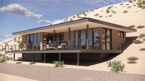 Photo of 56335 Eagles Nest Road, Yucca Valley, CA 92284 (MLS # JT24231279)