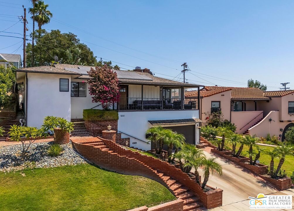 This home is all about the views! Move-in ready 2 bedroom, 2 bath plus a nicely sized bonus sunroom/office that is not included in the square footage. Remodeled inside and out. Recent upgrades include copper plumbing, custom closets, recessed lighting, new A/C and heat. This home also features owned solar for low electric bills. Cozy up by the fireplace in the living room or sit at the porch sipping your favorite drink as you watch the sunset over the downtown Glendale skyline. Wander over to the covered patio and large terraced backyard and enjoy panoramic city views as you listen to a cascading waterfall built into the hillside. The Neighborhood is filled with historic charm and close to great schools. Close proximity to major freeways, Glendale Galleria, The Americana and Downtown L.A.