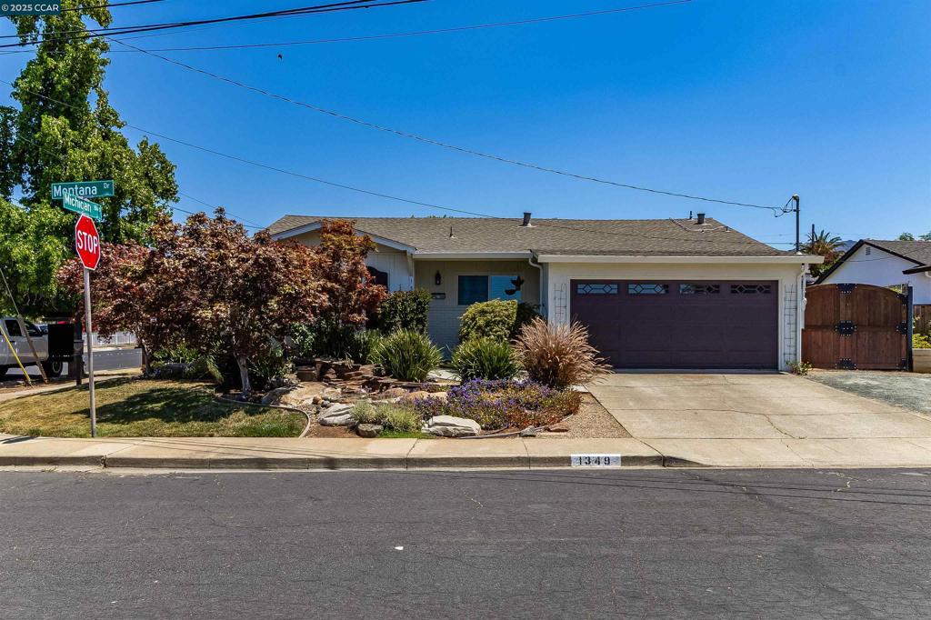 Welcome to 1349 Montana Dr, a charming corner-lot home in Concord freshly painted inside and out, offering move-in ready comfort, style, and outdoor living all in one. Step into a well-maintained interior with a warm, inviting feel and spacious layout. The backyard is perfect for relaxing or entertaining, featuring a newly refreshed patio with a cozy awning, iron fire pit, and lush grass area. Enjoy added convenience with RV parking along the side of the home. Ideal for your toys or extra vehicles. Located just minutes from downtown Clayton and the scenic trails of Mt. Diablo State Park, you’ll have easy access to charming local shops, weekend farmers markets, and miles of hiking, biking, and nature-viewing adventures. This immaculately maintained gem combines everyday function with outdoor charm in a peaceful setting. Your perfect place to call home!