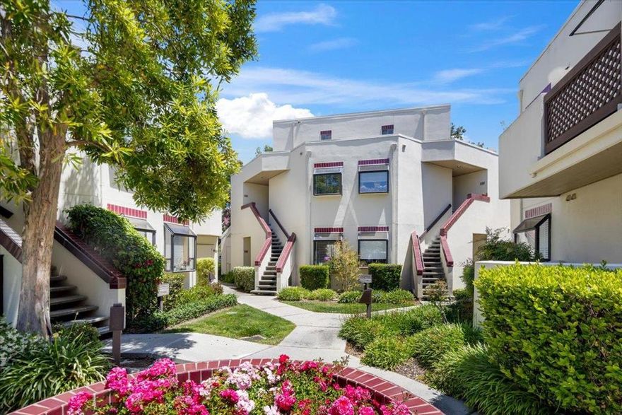 PRICE SLASHED! Motivated sellers have drastically reduced the price on this incredible top-floor, 2-bedroom, 2-bathroom condo. This is the opportunity you've been waiting for, and it gets even better: a preferred lender has already reviewed this property and is ready to qualify buyers with financing options as low as 3.5% down! Step inside and be greeted by soaring vaulted ceilings that create an amazing sense of space. This premier unit is ideally located on the cool, shady side of the building, offering tranquil views of the community pond and soothing fountain sounds. Enjoy the convenience of an in-unit washer and dryer, a cozy fireplace, and a private balcony. The smart layout features a main-floor bedroom and full bath, plus a private, loft-style bedroom suite upstairs. FINANCING IS MADE EASY! HOA covers water, sewer, garbage, common area maintenance, pools, and spa. At this new low price, this will not last. Contact us today to schedule your tour NOW!