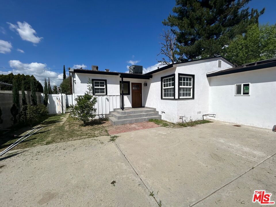 Beautiful updated home with rental property income. First property is a 3 bedroom 2 bath 1200 sqft with private backyard. Garage has been converted into JR ADU with full kitchen, bathroom and laundry. The second free standing unit is a brand new 2 story ADU just finished in the back with private access and private backyard. The newly built ADU features an open floor, high ceilings 2 bedroom, 2 and a half bathrooms with laundry unit inside as well with a 1200 sqft open floor plan. All units have with tankless water heaters installed. This property also has 2 power meters and 3 addresses. Solar panels are installed and fully paid for, no obligation to the new buyer to make lease payments. Everything is permitted, buyer to verify with local building and safety office.
