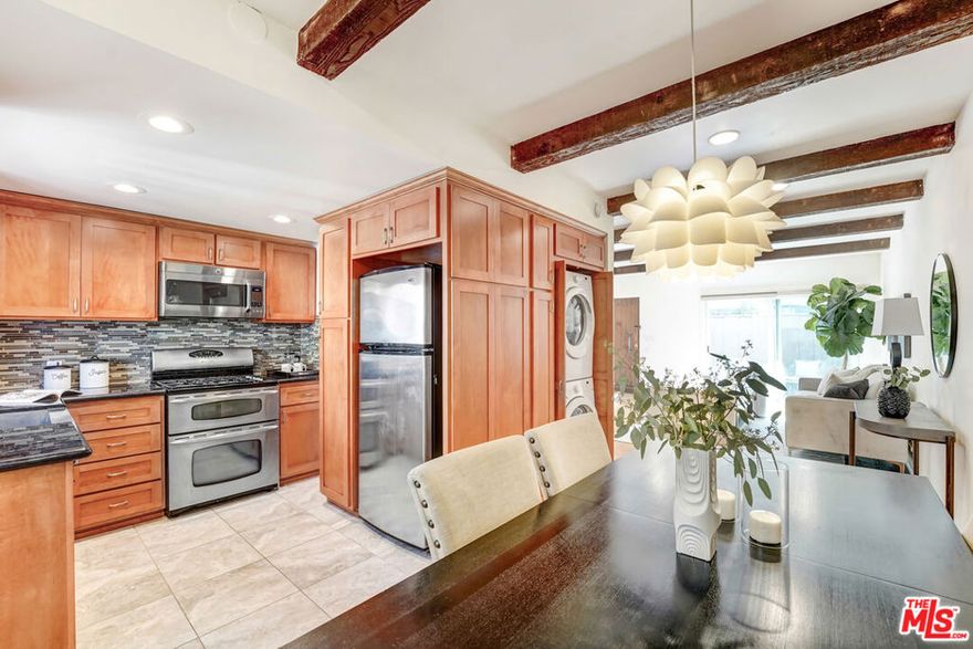 ***Newly Relaunched & Priced to Move!*** Now offered $35,000 below the recent appraisal and eligible for a grant of up to $20,000 with Citi Bank, which can be applied toward closing costs or an interest rate buydown, an incredible advantage for today's buyers. Step inside to find a light-filled layout with vaulted, beamed ceilings, warm wood flooring, and a private outdoor patio ideal for morning coffee or evening gatherings. The updated kitchen offers granite countertops, stainless steel appliances, and a functional design that makes everyday living easy. Perfectly situated near Playa Vista, Mar Vista, and Santa Monica, this home places you close to Westside amenities while giving you room to customize and build future equity. With its fresh pricing and outstanding buyer incentives, this is a standout opportunity in a highly desirable area.Act quicklyhomes like this don't stay available for long. Contact me for more information or to arrange a private showing!