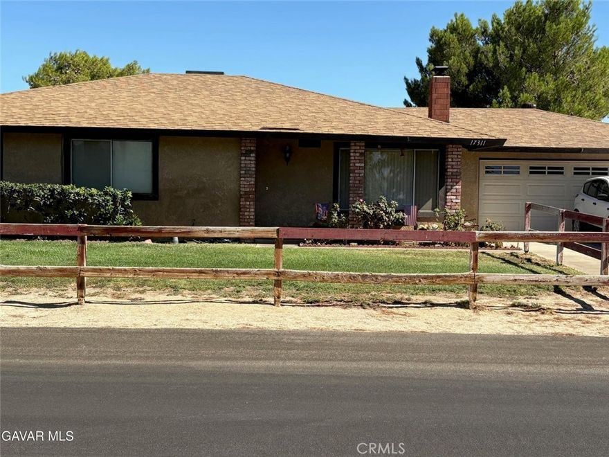 ''PRICE REDUCTION!'' FOR SALE! Sellers are the original owners of this 1986, Narcissa built, 3BR, 2BA on 22,409/.51 acres. The owners call it, Their little Oasis here i Lake Los Angeles, rural area of Palmdale CA., 93591. The property has been well maintained by the owners, all these years! Some changes and upgrades have been added in the past years, all documented. Security Screen Door, Fireplace, large window with drapes and white blinds, carpet and vinyl floors, all rooms have white blinds, there are ceiling fans with lights, recessed lighting in the kitchen, stove and over, refaced pantry & cabinet doors, drawers, built-in microwave, garbage disposal, dishwasher, water filtration, upgrade, counter-top and sink washer, dryer, 2 TV mounted on the wall living room & bedroom, Storage building 10x16" barn, cover Patio w/Spa/Hot Tub w/ cover, front & back fencing, trees, flower, bushes, other things the owners have to offers with this sale deal stated in the Convey with the property. There is RV Parking for a variety of usages on the property! This is a must see, sweet deal! Owners moving out of state and convey other items with the sale