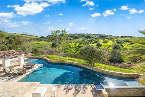 Photo of 64 Canyon Crk Crk, Irvine, CA 92603 (MLS # OC26022776)