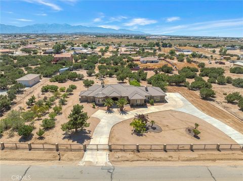 Photo of 7026 Cataba Road, Oak Hills, CA 92344 (MLS # HD26141872)