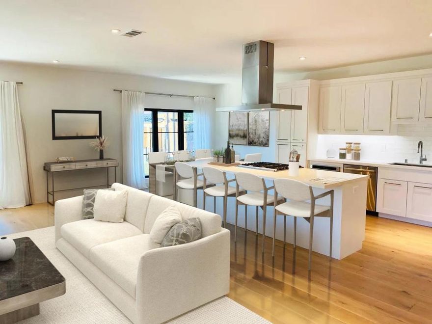 Steps to Downtown Menlo Park from this recently remodeled condominium in an exclusive small building. Spacious and light single level unit with it's own private entrance. Expansive living and dining room, 9' ceilings, open floor plan, contemporary white interior, wide plank European hardwood floors, double pane Andersen windows & doors, recessed & custom lighting. Huge chef's kitchen features island with seating and Professional Stainless Steel Appliances, white cabinetry and quartz counter tops. 2 recently remodeled bathrooms, feature white quartz & stone and tile finishes and quality chrome fixtures. Large, private wrap around balcony, ample storage space, Nest thermostat, central A/C. This is a secure building with 2 pedestrian gates and a secure garage. 2 Designated Parking Spaces, One Car Charger Dock and a Private Storage Room in garage. Large lot with professionally landscaped garden and expansive rear patio. Professionally managed building. There's nothing like this near downtown in West Menlo Park!