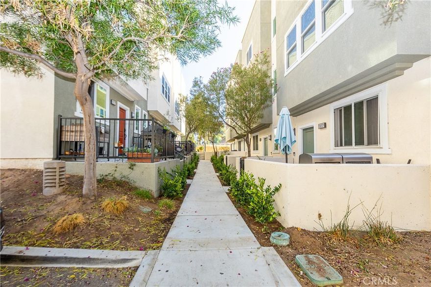 Welcome to 13219 Shaw Lane, a stylish tri-level modern townhouse located in the highly desirable Tovara Homes community of Sylmar. This home offers approximately 1,790 square feet of thoughtfully designed living space, featuring four bedrooms and four bathrooms, including a convenient downstairs bedroom perfect for in-laws, parents, or guests. The open and inviting floor plan showcases a contemporary kitchen with quartz countertops, upgraded finishes, and abundant cabinetry, while the spacious primary suite offers a private bath and generous closet space. Additional highlights include a tankless water heater, central HVAC, and an attached two-car garage with EV-ready potential. Set within a gated community with a low monthly HOA, this residence is ideally located near shopping, dining, parks, schools, and major freeways, offering the perfect blend of modern design, comfort, and convenience.
