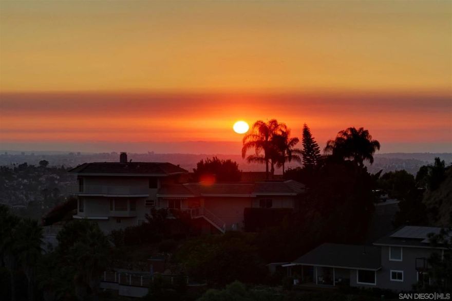 Magnificent Southwest-inspired estate perched atop one of Mt. Helix’s most prestigious view streets, offering breathtaking panoramic vistas stretching from Mexico to Downtown San Diego and the Coronado Islands. This exceptional 4-bedroom, 4.5-bath residence spans over 4,624 sq ft and is nestled on a private cul-de-sac, delivering tranquility, privacy, and grandeur. Expansive view windows fill the home with natural light and frame the stunning scenery from nearly every room. The open-concept layout features multiple living areas ideal for entertaining, complemented by a sparkling private pool and spa perfect for relaxing under the sun or stars. The home also offers a potential granny flat with its own private entrance, ideal for multi-generational living, guests, or rental income. With PAID SOLAR and timeless architectural charm, this property blends elegance and efficiency. A rare opportunity to own a view home of this scale and presence in the heart of Mt. Helix.  This gated 4,624 sq ft custom estate, built by Wanket Construction and designed by acclaimed architect Walter Lim, captures 180° unobstructed views of the ocean, Coronado Islands, Mexico, and surrounding mountains. Perched on one of Mt. Helix’s most prestigious view streets, this 4-bedroom, 4.5-bath home features a potential granny flat with its own entrance—ideal for a student, nanny, or office setup. Enjoy stunning views from nearly every room including the great room, kitchen, dining, family and billiard rooms, and the luxurious primary suite. Outdoor living is elevated with a pool, deck, and patio area designed to embrace Southern California sunsets. Highlights include a 3-car oversized garage, paid-off 32-panel solar system, newer roof, surround sound, dumbwaiter, laundry chute, cedar cabinetry with Saguaro Cactus accents, hardwood and Spanish tile flooring, dual-pane windows, and top-tier appliances including a brand new Sub-Zero fridge, Asko dishwasher, and new cooktop. Zoned heating and A/C provide year-round comfort. Professionally landscaped and thoughtfully upgraded throughout, this is a rare opportunity to own a truly elegant and uniquely crafted Mt. Helix masterpiece.
