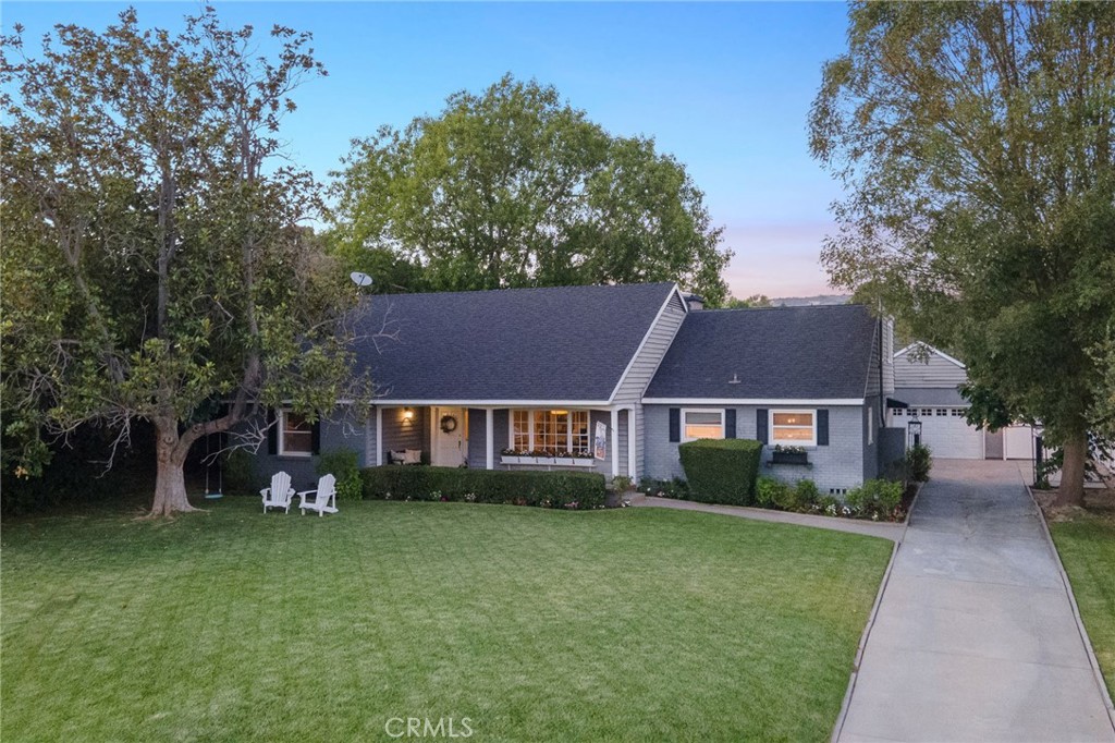 Discover this charming Cape Cod-style home nestled on a generous approx 20,363 sq ft lot in the desirable neighborhood of Friendly Hills. Meticulously maintained, this stunning pool residence offers approximately 3,356 sq ft of elegant living space, featuring 6 bedrooms and 3 bathrooms—perfect for family living and entertaining. Ideally situated on a peaceful cul-de-sac, this home combines timeless appeal with modern comfort.
Step inside to find a warm and inviting interior featuring beautiful wood floors that effortlessly blend classic Cape Cod charm with modern updates. The spacious primary bedroom is conveniently located on the main floor, alongside two additional bedrooms. On the opposite side of the home, you'll discover the remaining three bedrooms, all served by a stylish and well-appointed hallway bathroom.
The spacious, upgraded kitchen boasts a six-burner gas range, double ovens, quartz countertops, a kitchen island, and stainless steel appliances. A charming nook with a cozy sitting area is tucked into the corner, ideal for casual meals or relaxing with a cup of coffee.
The expansive backyard is an entertainer’s paradise, offering endless opportunities for outdoor living. Whether gardening, hosting gatherings, or unwinding in your private retreat, this generous lot provides the perfect backdrop. Blending timeless charm with modern amenities, this property is an ideal sanctuary for those who value space, comfort, versatility, and a love for hosting and entertaining.
A standout feature of this property is the detached guest house, approximately 450 sq ft, already included in the total square footage. This versatile space boasts an open-concept design with a kitchenette and bathroom, offering privacy and comfort for visitors, family members, or even as a home office or rental opportunity.
Don’t miss your opportunity to own this exceptional Cape Cod-style home, complete with a charming guest house, nestled in one of Whittier’s most desirable neighborhoods—Friendly Hills!