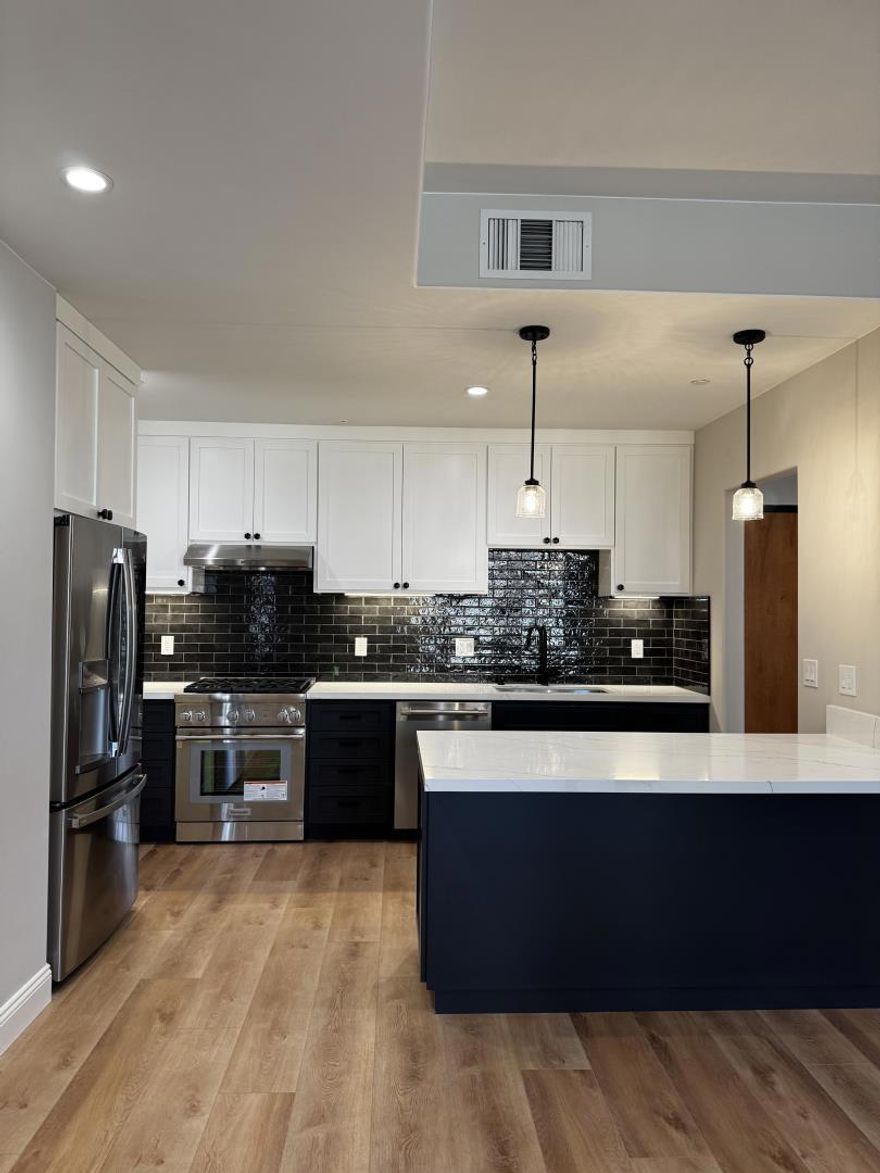 *The images shown are of a model unit and are for illustrative purposes only* Mediterranean elegance meets modern living at Provence Condominiums in Palo Alto. This luxury 4-story building offers resort-style amenities including a pool, hot tub, secure 2-level parking garage with EV chargers, and Caffe Riace on-site. Built in 1997 and updated over time, this 30-unit community is just blocks away from California Ave dining, shops, and cafes. Units feature high ceilings and balconies, A/C, and floor-to-ceiling windows in select residences. Some units include luxury vinyl plank flooring, quartz countertops, and Thermador stoves. Choose from fully renovated units or upgrade an as-is unit using our in-house design board. Every unit comes with dedicated storage and garage parking. Located near Stanford, Caltrain, and major tech employers, this is the perfect blend of convenience, comfort, and lifestyle in the heart of Silicon Valley. Don't miss this rare opportunity to own in one of Palo Altos most desirable communities. The actual unit may vary in layout, finishes, and features. Prospective buyers are encouraged to visit the site and consult with our sales team for detailed information about the specific units being sold. This unit is a remodeled middle unit with 2 balconies.