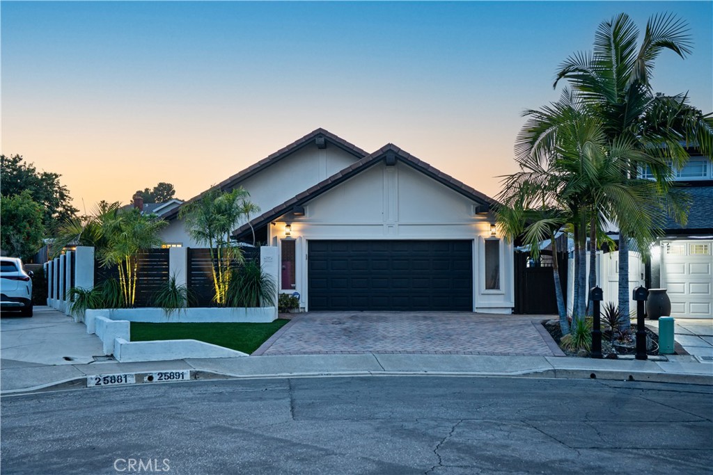 Welcome to this stunning single-story pool home nestled in the highly desirable Castle Hill community of Laguna Hills. Proudly positioned on a large lot, over 8,400 sq.ft, at the end of a quiet cul-de-sac, this rare find showcases impeccable style and quality craftsmanship. Be welcomed into a sun-filled, Richmond open floor plan that boasts vaulted ceilings, a custom fireplace, bay windows, formal dining area and a large family room. The extensively upgraded home features a remodeled kitchen with quartz countertops, custom cabinets and backsplash, dual pane windows, recess lights, custom paint, and an opulently remodelled en-suite master bathroom. Pristine slider doors lead from the family room and dining room to an oversized wrap-around landscaped backyard adorned with lush foliage and a large, sparkling pool with a spa - the perfect environment for celebrations or relaxed family gatherings. Conveniently located a short stroll from Knotty Pine Park, close to the 5 FWY, shopping, dining and within an award-winning school district, this meticulously cared for, upgraded home offers an unrivaled opportunity to join this vibrant, friendly community!
