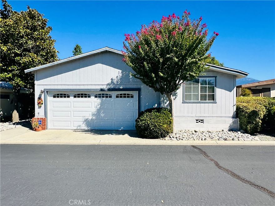 Immaculate 2-Bedroom + Den in Sought-After 55/40 Senior Community
Move-in ready and designed for comfort, this beautifully maintained home features 2 spacious bedrooms, 2 full baths, and a versatile den that can easily serve as a third bedroom, office, or hobby space. The open-concept layout offers a seamless flow through the generous living room—with a cozy fireplace—and the adjacent dining area, perfect for both everyday living and entertaining.

You'll love the warm oak cabinetry, abundant natural light, and the private, landscaped side yard, ideal for outdoor dining or relaxing in the sunshine. This home is a rare find, offering a 2-car garage with built-in attic storage—a hard-to-find feature in this community.