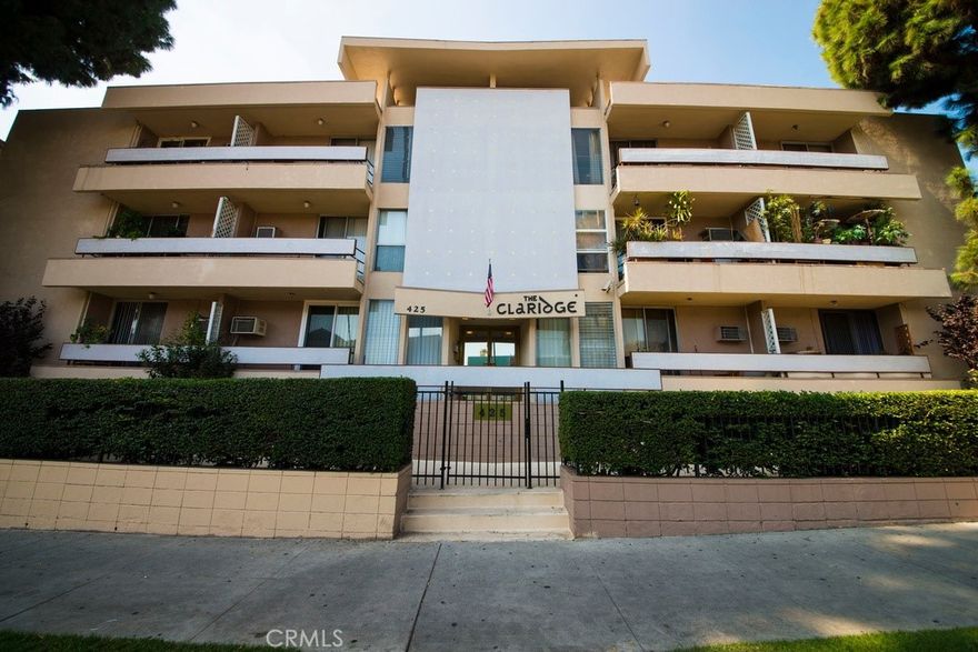 Welcome to this thoughtfully designed one-bedroom residence in the heart of Koreatown, one of Los Angeles’s most dynamic and culturally rich neighborhoods. Perched on the top floor, the home offers an open and efficient layout with generous living and dining areas, ample natural light, and a well-appointed kitchen with plenty of cabinet space. The bedroom features a custom wardrobe system with mirrored sliding doors, while the hallway provides additional mirrored storage for everyday ease. Residents enjoy secured building entry, assigned parking in a gated garage, and convenient on-site laundry facilities. Perfectly positioned near the Wilshire Corridor and just moments from the Purple (D) Metro Line, this location connects easily to Downtown Los Angeles, Miracle Mile, and Hollywood. Surrounded by a celebrated dining scene, independent cafés, and neighborhood markets, the property combines urban energy with daily convenience. Whether serving as a comfortable personal home or a sound addition to an investment portfolio, this Koreatown condo offers enduring value in one of the city’s most connected and evolving districts.