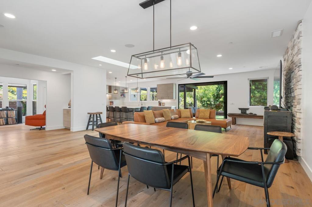 Just blocks from San Diego’s premier beaches and vibrant dining scene, this custom-designed single-story beach home in Encinitas Highlands offers the ultimate in coastal living. Every inch of this home exudes thoughtful design, from the wide-plank European white oak flooring to the sleek lighting fixtures. Expansive bi-folding doors seamlessly blend indoor and outdoor living, opening to a beautifully landscaped 16,000 sq. ft. private lot — complete with a detached guest house (approx. 518 sq. ft.), perfect for visitors or a home office. This is a rare opportunity to own a one-of-a-kind coastal retreat where style, comfort, and location converge. There is truly nothing else like it on the coast! Additional features include an open-concept layout, Thermador kitchen appliances, Puronics water softener and reverse osmosis filters, new tankless water heater, new toilets, new paint. Don’t miss this unique gem!