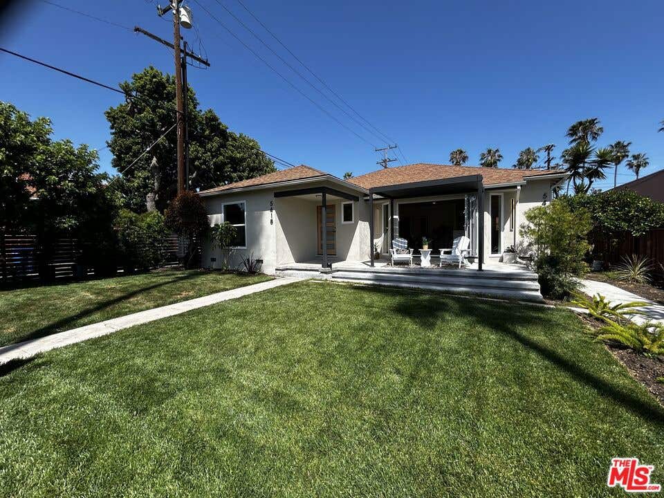 Photo of 5418 S Rimpau Boulevard, Los Angeles, CA 90043 (MLS # 26840063)